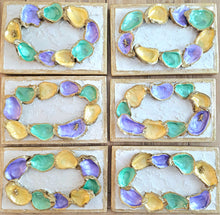 Oyster King Cake on Wooden Plaque